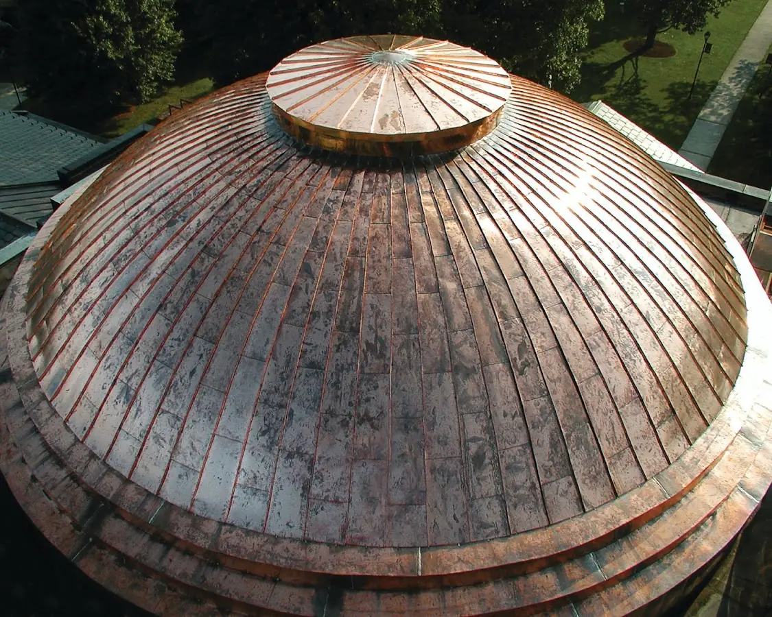 Craftsman Roofing crew installing a new roof in Manville